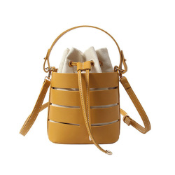 2018 New Tide Solid Color Hollow PU Material Small Fairy Bag Portable Bucket Bag Casual Wild Single Shoulder Messenger Bag